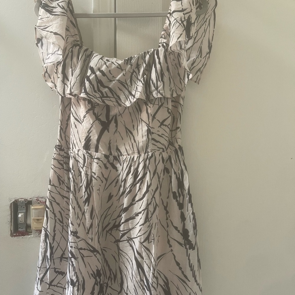 Chic Black and Cream Patterned Mini Dress